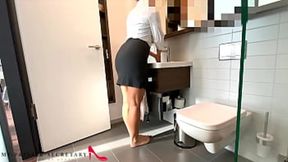 executive in sleek skirt leans back for intimate encounter without barrier