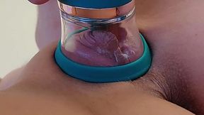 My chubby pussy reaches a vivid orgasm from this vacuum vibrator.
